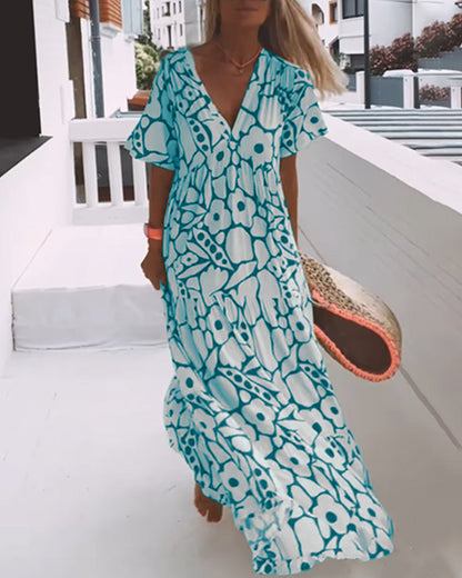 Vestido Longo Estampado com Decote em V