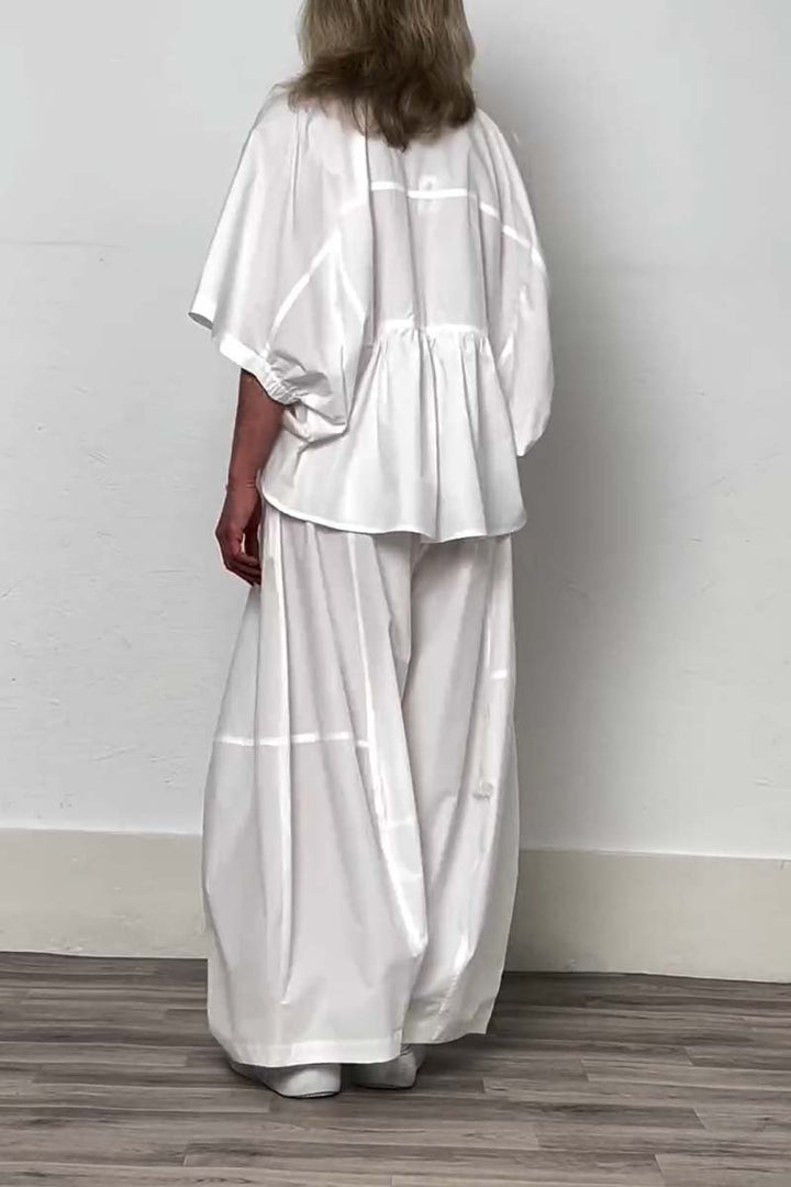 Conjunto Feminino Casual com Top Curto de Decote em V e Calças de Cor Sólida