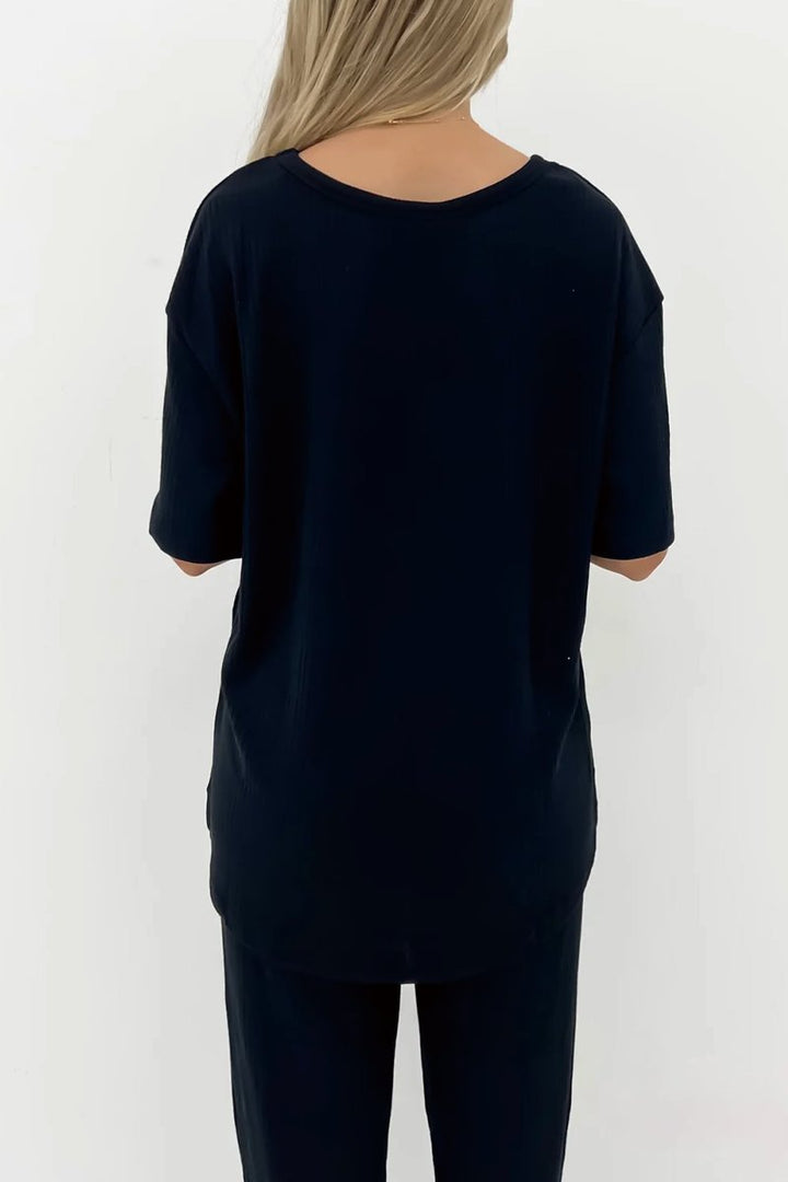 Conjunto Feminino de Top Canelado de Cor Sólida e Calças