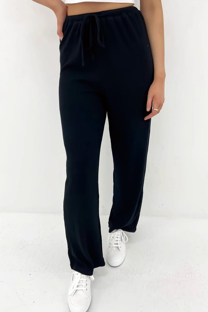 Conjunto Feminino de Top Canelado de Cor Sólida e Calças