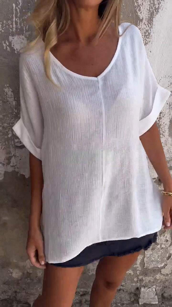 Top casual com mangas médias e decote em V