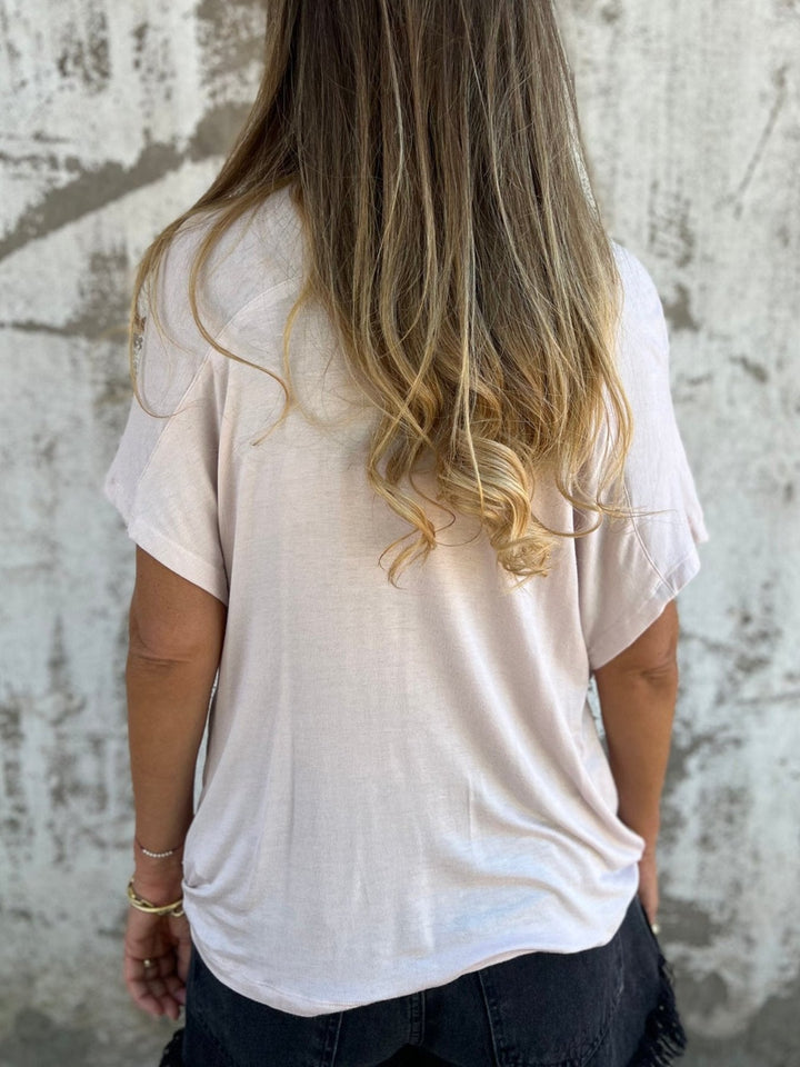 Blusa feminina casual com torção frontal e cor sólida