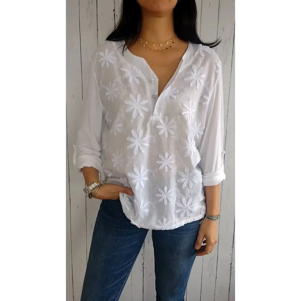 Top com decote em V mangas médias e design floral 3D