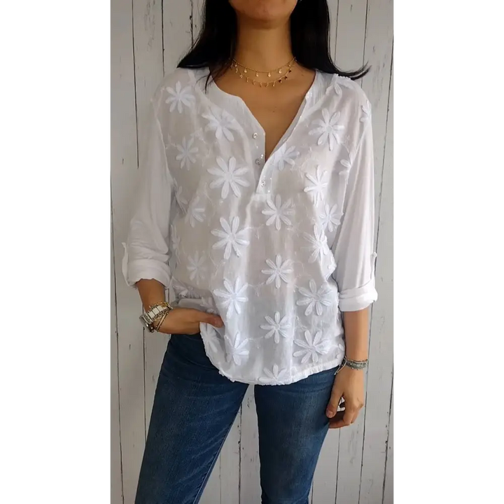 Top com decote em V mangas médias e design floral 3D