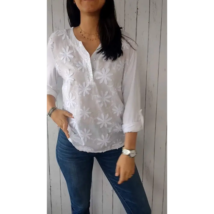 Top com decote em V mangas médias e design floral 3D