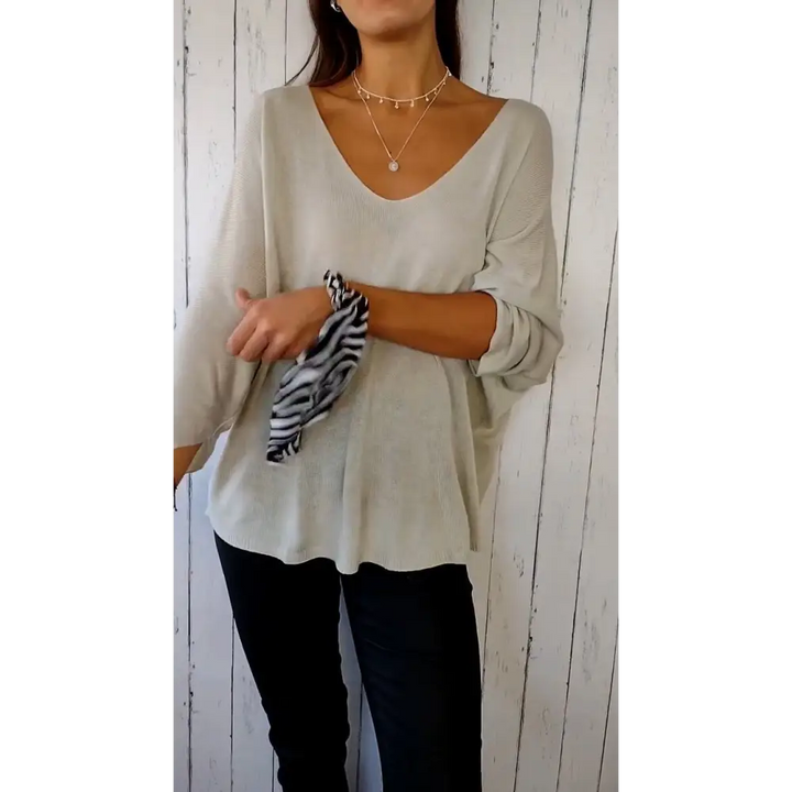 Top confortável de mangas longas com decote em V