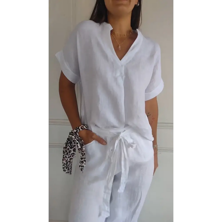 Top de algodão e linho com decote em V e mangas curtas