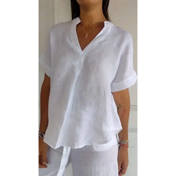 Top de linho e algodão com decote em V e mangas curtas